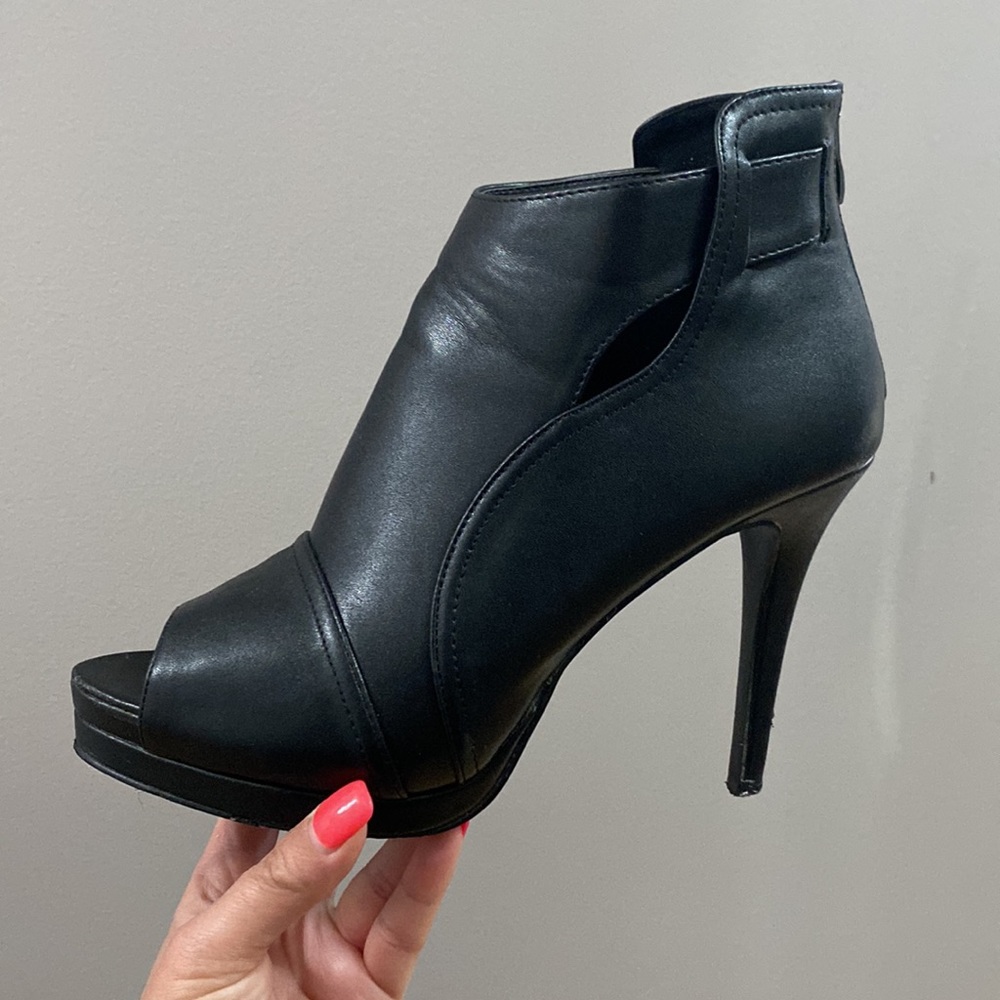 Open toe high heel booties.